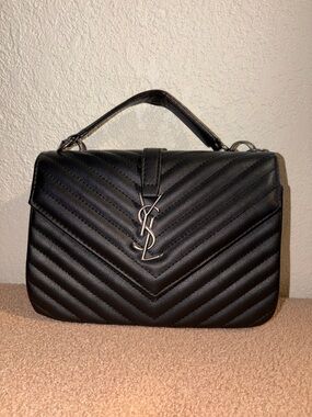 Black cross body inspired not authentic